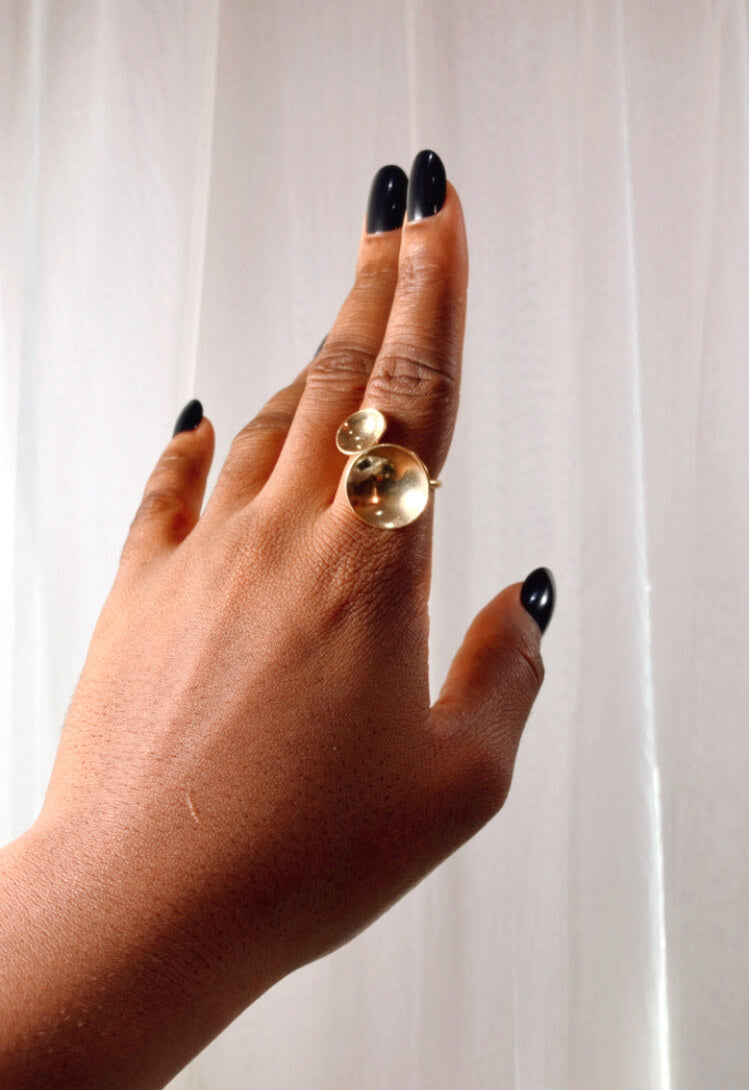 zivanora double domed disc bypass ring in gold plated brass