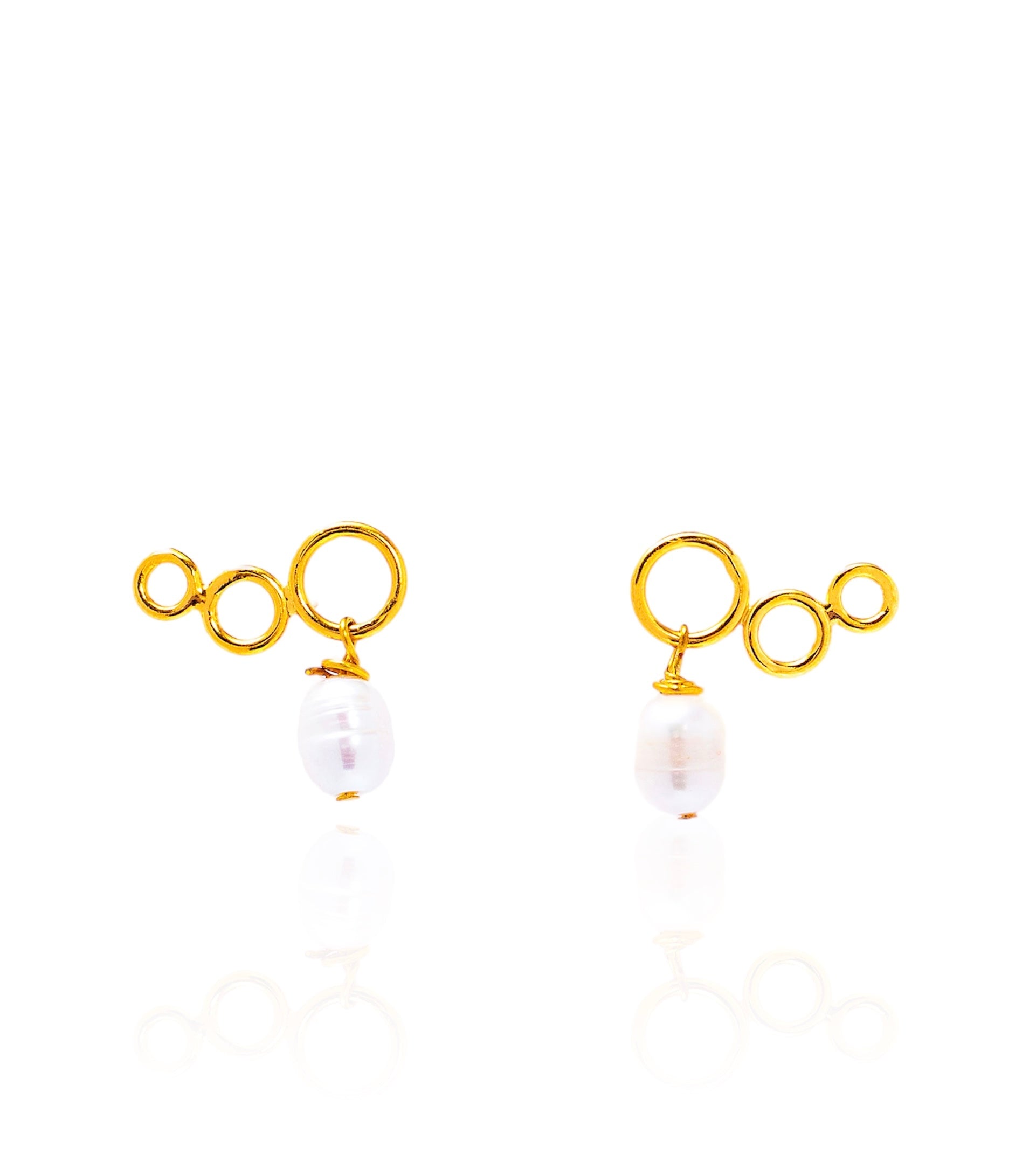 gold ear crawlers with white pearls